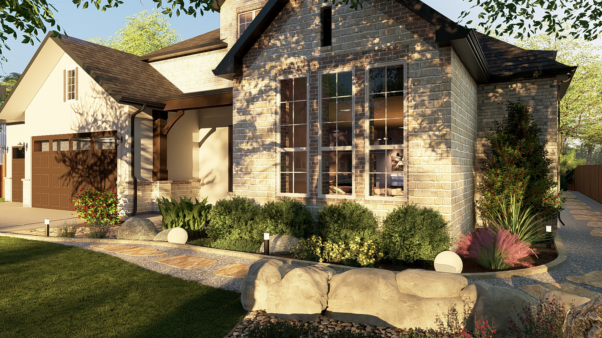 Foundation planting with boulders and ornamental grasses