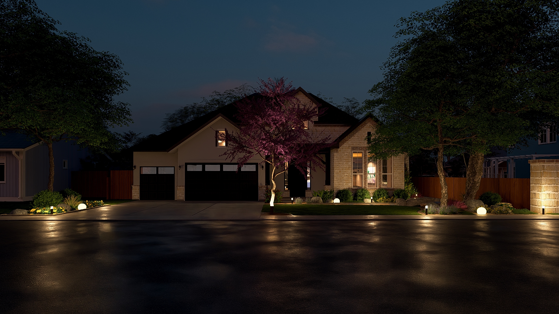 Residential landscape design with uplighting at night