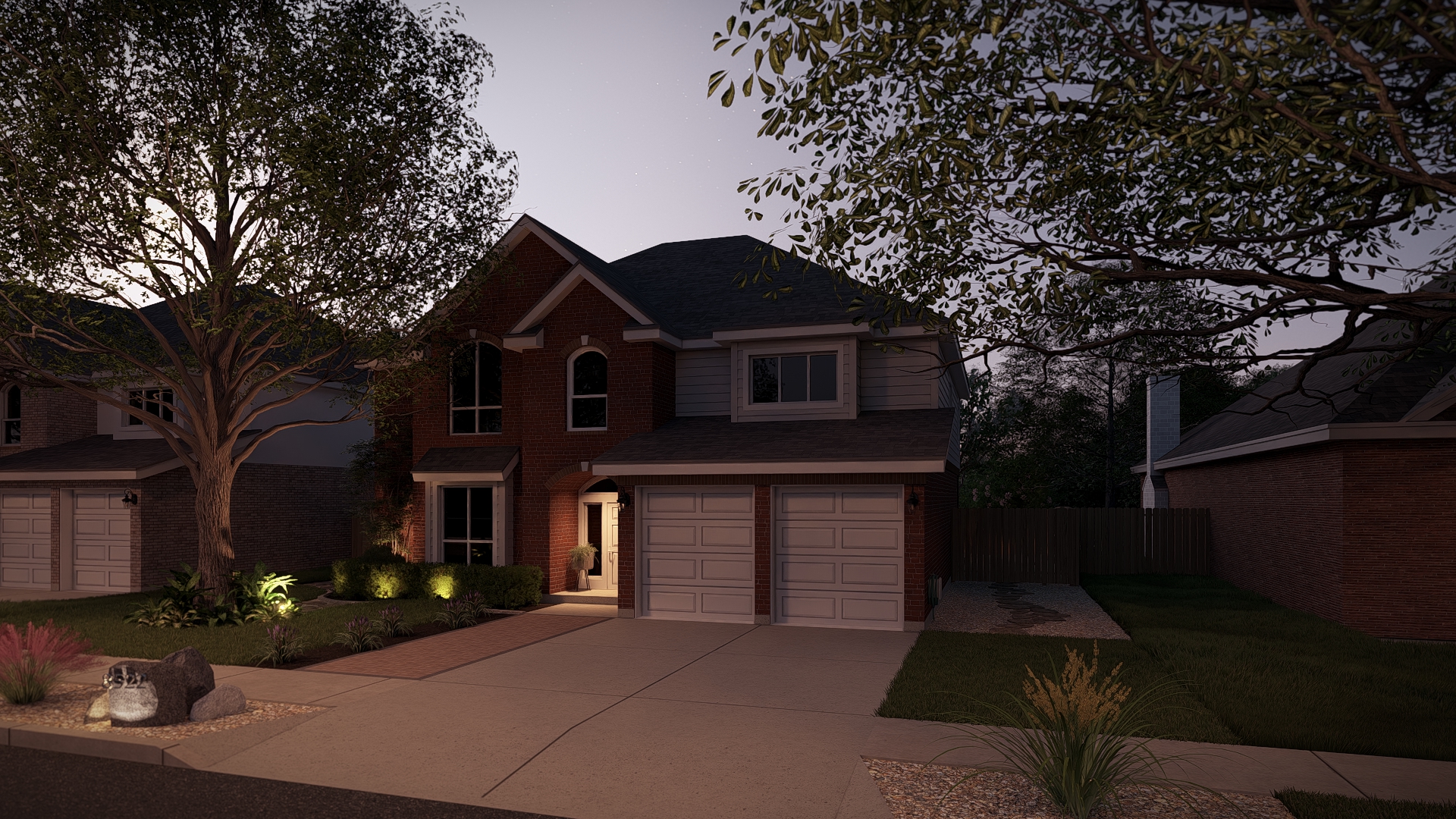 Evening view with warm uplighting on foundation beds