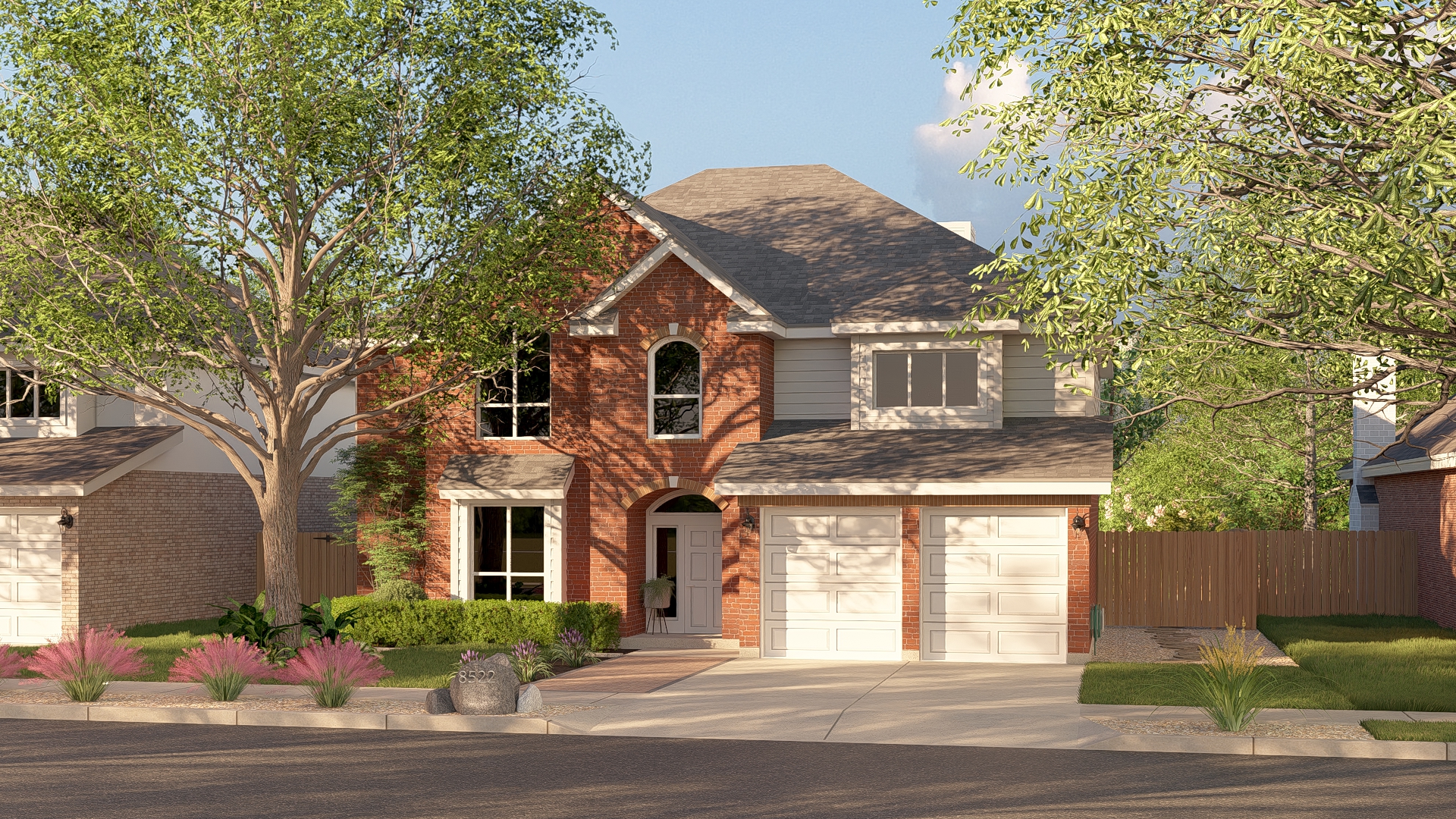 Stone Creek Residence front view with pink muhly grass and mature shade tree